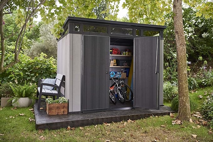 Keter Artisan 9x7 Foot Large Outdoor Shed with Floor with Modern Design for Patio Furniture, Lawn Mower, Tools, and Bike Storage, feet, Grey/Black