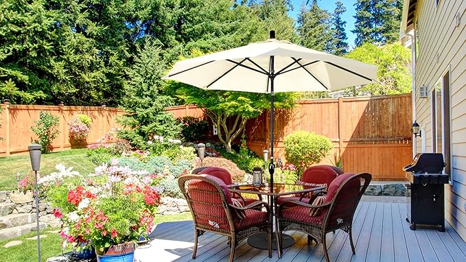 California Umbrella 9' Round Aluminum Market Umbrella, Crank Lift, Push Button Tilt, Black Pole, Sunbrella Antique Beige
